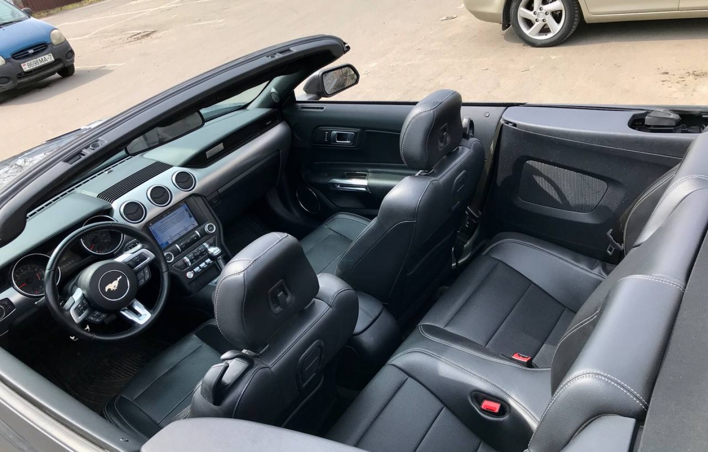 Аренда  Ford Mustang VI Cabrio  5 класса 2019 года в городе Минск от 134 $/сутки,  двигатель: Бензин , объем 2.3 AT EcoBoost литров, КАСКО (Мультидрайв), без водителя, вид 6 - West Group